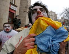 Activists in zombies costumes