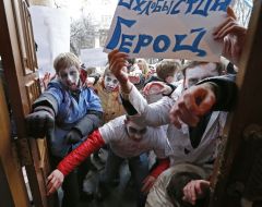 Activists in zombies costumes