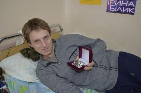 Soldier holding an award