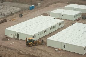 Installation of modular homes for settlers