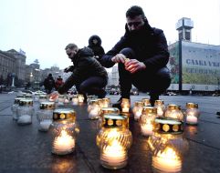 The action participants light candles
