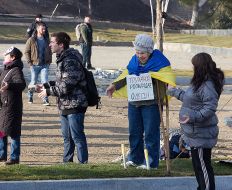 Activists pass disassembled pieces of roadway
