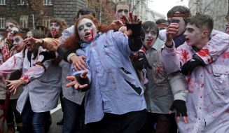 Activists in zombies costumes