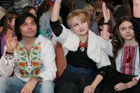 Vitaly Borysyuk with his daughter Anna and Maria Burmaka