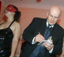 Oles Buzina with half-naked models