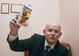 Oles Buzina with half-naked models