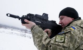 Soldier demonstrates machine "Maliuk"
