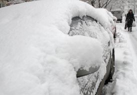 Snow-covered cars