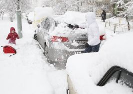 Snow-covered cars