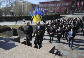 Participants of the laying flowers ceremony