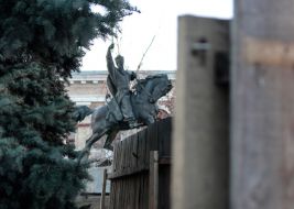 Construction fence around the monument to Sagaydachny