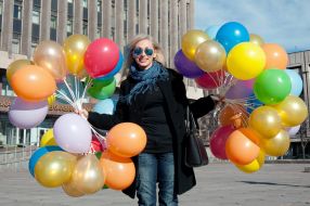 Girl with balloons meets fighters