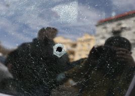 Car with bullet traces