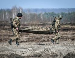 Servicemen at the landfill