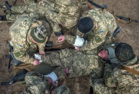 Servicemen at the landfill