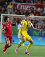 Yevhen Khacheridi and David Silva