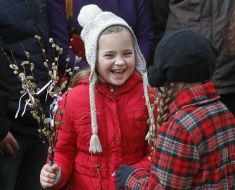 Parishioners during the consecration of willow
