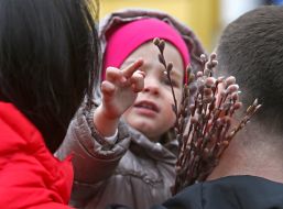 Parishioners during the consecration of willow
