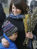 Parishioners during the consecration of willow