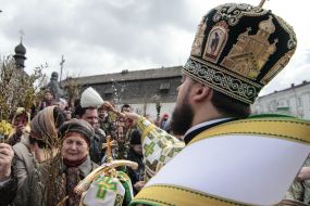 The priest blesses the willow