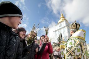 The priest blesses the willow