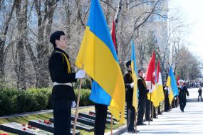 Laying flowers at the Eternal Flame
