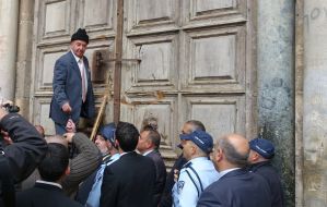 Opening the doors of the Temple of the Holy Sepulchre