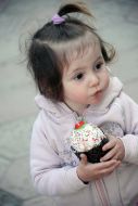 Girl holding Easter cake