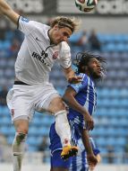 Demersi Mbokani and Andrew Pilyavskii