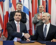 Petr Poroshenko, Jose Angel Gurria and Aivaras Abromavicius