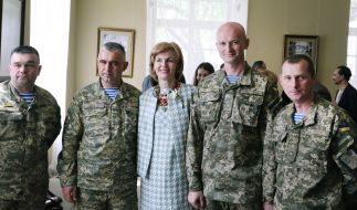 Catherine Keith Sadovaya with soldiers participating ATO