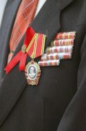 The medal on his lapel
