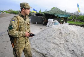 Ukrainian soldier at the checkpoint