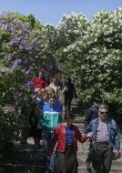 People walk through the botanical garden