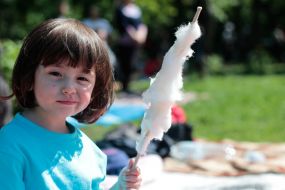 Child eating cotton candy