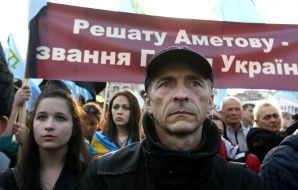 Member of mourning rally