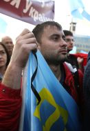 Member of mourning rally