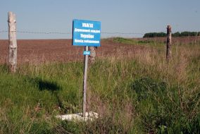 Pillar with warning labels