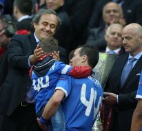Soccer. Michel Platini, Artem Fedetskiy with his son