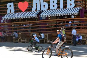 Children ride bicycles