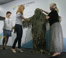 Презентация маскировочного костюма "Ghillie"