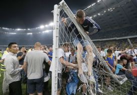 The fans break the gates