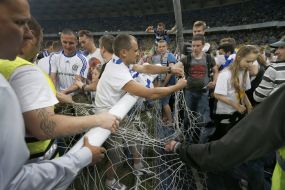 The fans break the gates