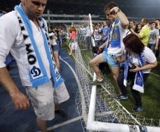 The fans break the gates