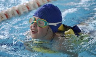 Girl swimming in the pool