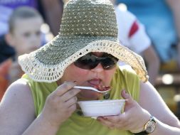 Woman eating soup