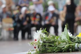 Flowers near the monument of Glory