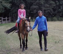 Girl riding a horse