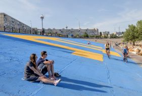 Painted flag of Crimean Tatars on the waterfront in Kiev