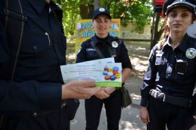 Employees of patrol police hold cards